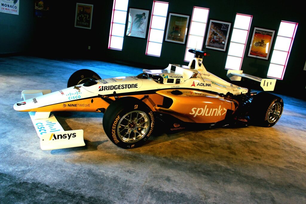 The Black and Gold race car, side view